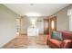 Inviting living room featuring hardwood floors, natural light, and comfortable seating at 16371 State Road 38 E, Noblesville, IN 46060