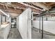 Unfinished basement featuring exposed ductwork and concrete flooring at 2006 Lexington Ave, Indianapolis, IN 46203