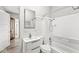 This bathroom features a single vanity, toilet, and tub with shower at 2006 Lexington Ave, Indianapolis, IN 46203