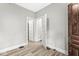 This bedroom features neutral paint and wood-look floors at 2006 Lexington Ave, Indianapolis, IN 46203