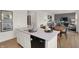 Bright and spacious kitchen with white cabinets, island, and stainless-steel appliances at 2220 Foothill Dr, Greenfield, IN 46140