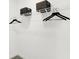An organized closet features a white shelf, black hangers, and dark wooden storage bins at 2230 Hemlock Cir, Greenfield, IN 46140