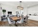 Open layout with living and dining areas, offering a blend of comfort and modern design at 2230 Hemlock Cir, Greenfield, IN 46140