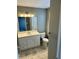 Bathroom featuring a single sink vanity and standard toilet at 2250 N Pennsylvania St # 8, Indianapolis, IN 46205