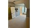 Bedroom with carpet, closet with sliding door, and adjacent window seat at 2250 N Pennsylvania St # 8, Indianapolis, IN 46205