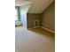 Bedroom featuring neutral carpet, window bench, and built-in storage at 2250 N Pennsylvania St # 8, Indianapolis, IN 46205