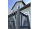 Low angle of deck showing house siding and windows at 2250 N Pennsylvania St # 8, Indianapolis, IN 46205