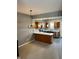 Spacious kitchen featuring wood cabinets, stainless steel appliances, and modern lighting at 2250 N Pennsylvania St # 8, Indianapolis, IN 46205
