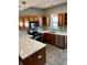 Updated kitchen features stainless steel appliances, quartz countertops, and wood cabinetry at 2250 N Pennsylvania St # 8, Indianapolis, IN 46205