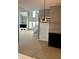 Bright and airy living room with high ceilings and a staircase to the upper level at 2250 N Pennsylvania St # 8, Indianapolis, IN 46205