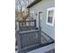 Private porch with wooden decking and railing, perfect for relaxing outdoors at 2250 N Pennsylvania St # 8, Indianapolis, IN 46205