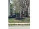 Neatly landscaped yard with dark mulch and a view of fencing at 2250 N Pennsylvania St # 8, Indianapolis, IN 46205