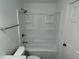 This bathroom features an updated shower and bath at 265 Bittersweet Dr, Whiteland, IN 46184
