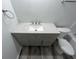 This bathroom features a neutral-colored vanity with a modern sink at 265 Bittersweet Dr, Whiteland, IN 46184