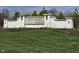 Community entrance sign for BO-MAR Estates, featuring a white stone wall and manicured lawn at 2721 Bo Street W, Plainfield, IN 46168