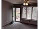 Bedroom featuring access to a private deck through a glass door and large windows with blinds at 2856 Colony Lake East Dr, Plainfield, IN 46168