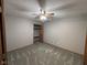 Cozy bedroom with neutral walls and plush carpeting, featuring closet and natural light at 2856 Colony Lake East Dr, Plainfield, IN 46168
