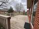 Spacious wooden deck perfect for outdoor entertaining, overlooking the lovely backyard at 2856 Colony Lake East Dr, Plainfield, IN 46168