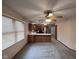 Open-concept kitchen with a view of the Gathering room, featuring wood cabinetry and modern appliances at 2856 Colony Lake East Dr, Plainfield, IN 46168