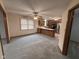 Spacious open-concept living area flows into kitchen with ample countertop space and stainless steel appliances at 2856 Colony Lake East Dr, Plainfield, IN 46168