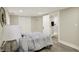 Bedroom with wood-look floors and an ensuite bathroom with a step-in shower at 2915 E 19Th St, Indianapolis, IN 46218
