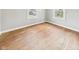 Bedroom with hardwood floors and natural light from the windows at 2920 Lincoln St, Anderson, IN 46016