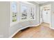 Cozy living room with bay window and hardwood floors offering plenty of natural light at 2920 Lincoln St, Anderson, IN 46016