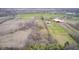 Aerial view of agricultural land, showing fields and farm buildings at 3110 S County Road 225 East, Danville, IN 46122