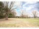 Brick home with a well-manicured front yard and mature trees at 3110 S County Road 225 East, Danville, IN 46122