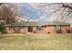 Attractive brick ranch home with a tidy lawn and well-placed shrubbery at 3110 S County Road 225 East, Danville, IN 46122