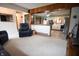 Open living area with view to the kitchen featuring stainless steel appliances and an open floor plan at 3110 S County Road 225 East, Danville, IN 46122