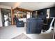 Comfortable living room featuring recliner seating and an open layout with a clear view into the adjacent kitchen at 3110 S County Road 225 East, Danville, IN 46122
