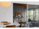 Cozy bonus room with a modern table, wood ceiling and lots of natural light at 315 Sunset Dr, Columbus, IN 47201