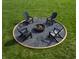 Relaxing backyard fire pit area surrounded by Adirondack chairs and pea gravel on a well manicured lawn at 315 Sunset Dr, Columbus, IN 47201