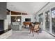 Bright living room with hardwood console, comfortable sofas, chair, and scenic views at 315 Sunset Dr, Columbus, IN 47201