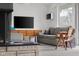Comfortable living room with a modern TV, plush seating, and stylish accents at 315 Sunset Dr, Columbus, IN 47201
