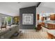 Open concept living space flowing to kitchen with contemporary design and natural light at 315 Sunset Dr, Columbus, IN 47201