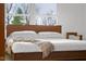 Comfortable main bedroom with neutral tones and a large window at 315 Sunset Dr, Columbus, IN 47201