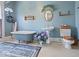 Vintage bathroom featuring a clawfoot tub, pedestal sink, and classic fixtures at 3308 S 600 E Rd, Waldron, IN 46182