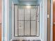 Bathroom with a glass door shower and tile flooring at 3308 S 600 E Rd, Waldron, IN 46182