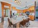 Spacious kitchen featuring granite countertops, stainless steel appliances, and custom wood cabinetry at 3308 S 600 E Rd, Waldron, IN 46182