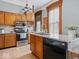 Close up of the kitchen featuring stainless steel appliances and granite countertops at 3308 S 600 E Rd, Waldron, IN 46182