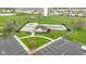 Aerial shot of neighborhood amenities; a pool, playground, grassy areas, and parking at 3511 Limesprings Ln, Whitestown, IN 46075