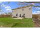 Wide backyard featuring furniture, patio, grill and the exterior of the home at 3511 Limesprings Ln, Whitestown, IN 46075