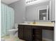Bathroom featuring a vanity with plenty of drawer space, a mirror and shower/tub combo at 3511 Limesprings Ln, Whitestown, IN 46075