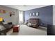 Stylish Bedroom with gray and blue walls, crib, comfortable seating, and thoughtful decor, perfect for a little one at 3511 Limesprings Ln, Whitestown, IN 46075
