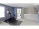 Upstairs bonus room featuring exercise equipment and neutral carpeting at 3511 Limesprings Ln, Whitestown, IN 46075