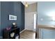 Foyer featuring a white door with sidelight, modern paint and stylish decorations at 3724 W 42Nd Ter, Indianapolis, IN 46228