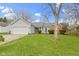 Charming single-story home with a well-manicured front yard and attached two-car garage at 3724 W 42Nd Ter, Indianapolis, IN 46228