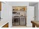 Laundry room with front loading washer and dryer at 3724 W 42Nd Ter, Indianapolis, IN 46228